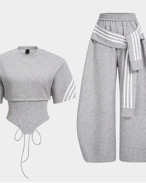 Neatly folded dry-fit shirts, sports shorts, and athletic gear